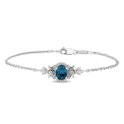 Enchanted Disney Fine Jewelry Sterling Silver with 1/20 CTTW Diamond and  London Blue Topaz Cinderella Bracelet