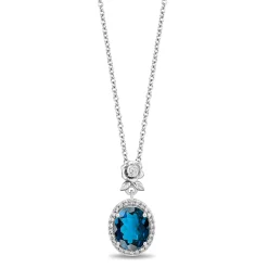 Enchanted Disney Fine Jewelry Sterling Silver with 1/10 CTTW Diamond and London Blue Topaz Cinderella Halo Pendant Necklace