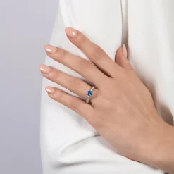 Enchanted Disney Fine Jewelry Sterling Silver with 1/5 CTTW Diamond and London Blue Topaz Cinderella Ring