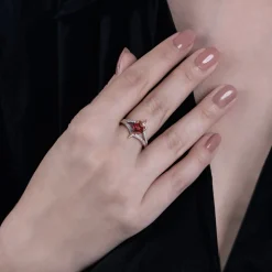 Enchanted Disney Fine Jewelry Sterling Silver and 10K Rose Gold with 1/10 CTTW Diamond with Red Garnet Evil Queen Ring