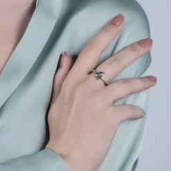 Enchanted Disney Fine Jewelry Sterling Silver with 1/10 CTTW Diamond and London Blue Topaz Cinderella Blue Bird Ring