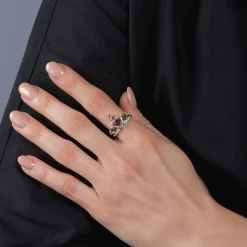 Enchanted Disney Fine Jewelry 10K Yellow Gold and Sterling Silver with 1/5 CTTW Diamond and Red Garnet Evil Queen Ring