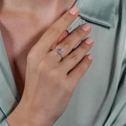 Enchanted Disney Fine Jewelry Sterling Silver with 1/20 CTTW Diamond with Swiss Blue Topaz Frozen 2 Elsa Snowflake Ring