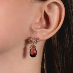 Enchanted Disney Fine Jewelry 14k Rose Gold 1/15 CTTW Diamond and Garnet Snow White Bow Earrings