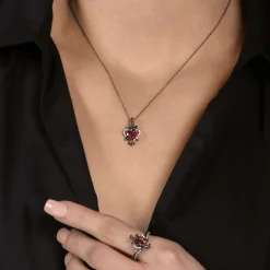 Enchanted Disney Fine Jewelry Black Rhodium over Sterling Silver Evil Queen with 1/10 CTTW Diamond and Red Garnet Dagger Ring