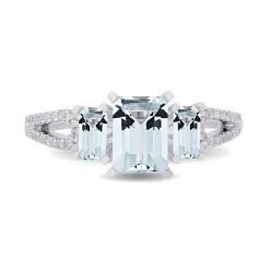 Enchanted Disney Fine Jewelry Sterling Silver with 1/8 CTTW Diamond and Sky Blue Topaz Elsa Ring