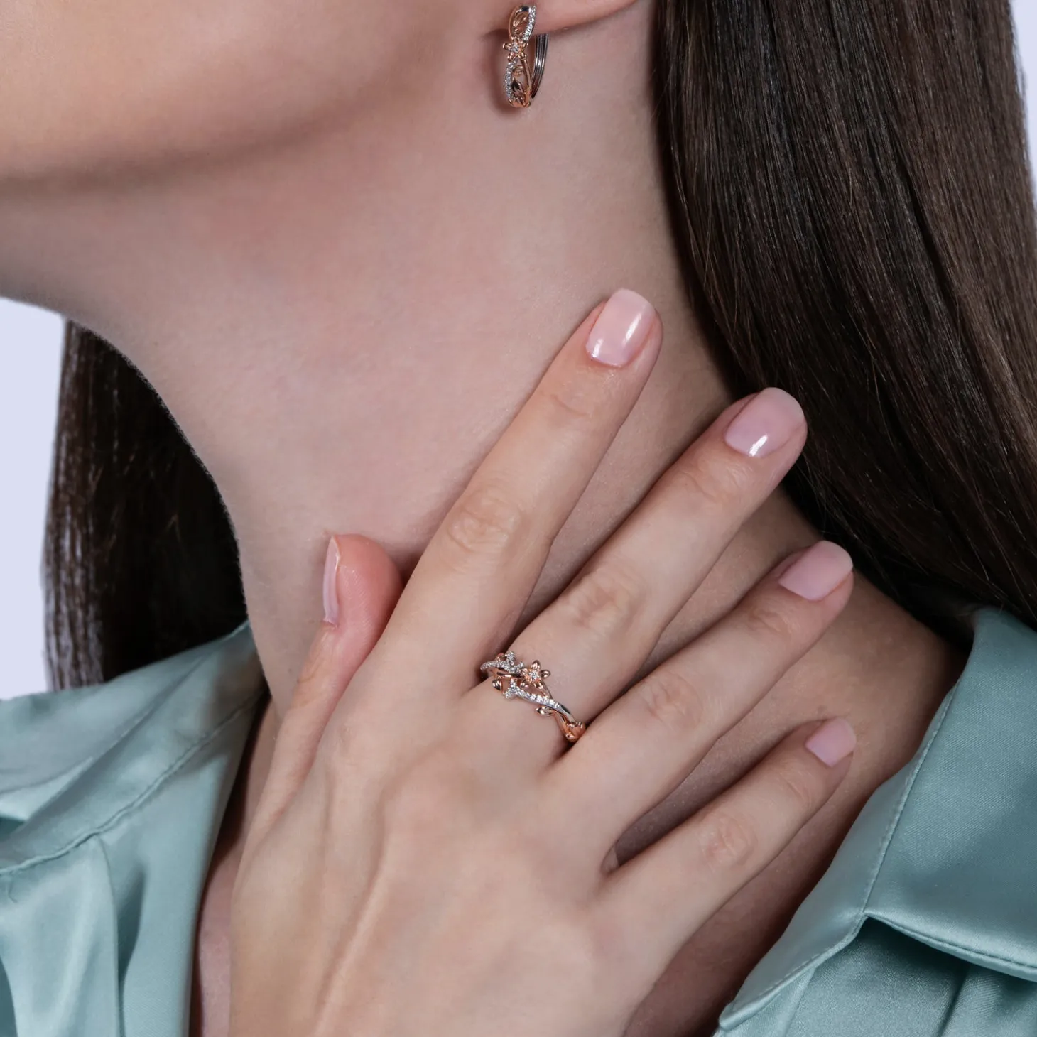 Enchanted Disney Fine Jewelry Sterling Silver and 10K Rose Gold with 1/10 CTTW Diamond Rapunzel Magical Flower Ring