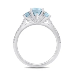 Enchanted Disney Fine Jewelry Sterling Silver with 1/8 CTTW Diamond and Sky Blue Topaz Elsa Ring